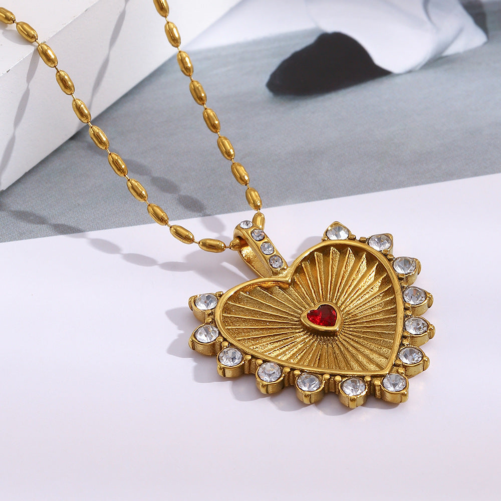 Stainless steel plated 18K gold carved heart-shaped necklace